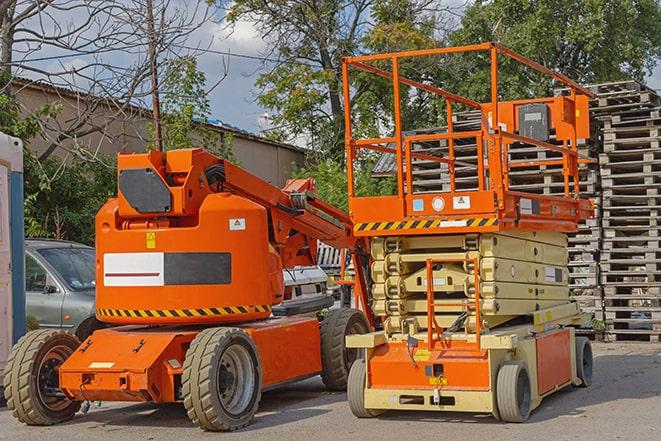 industrial forklift transporting goods in a warehouse setting in Allison, IA